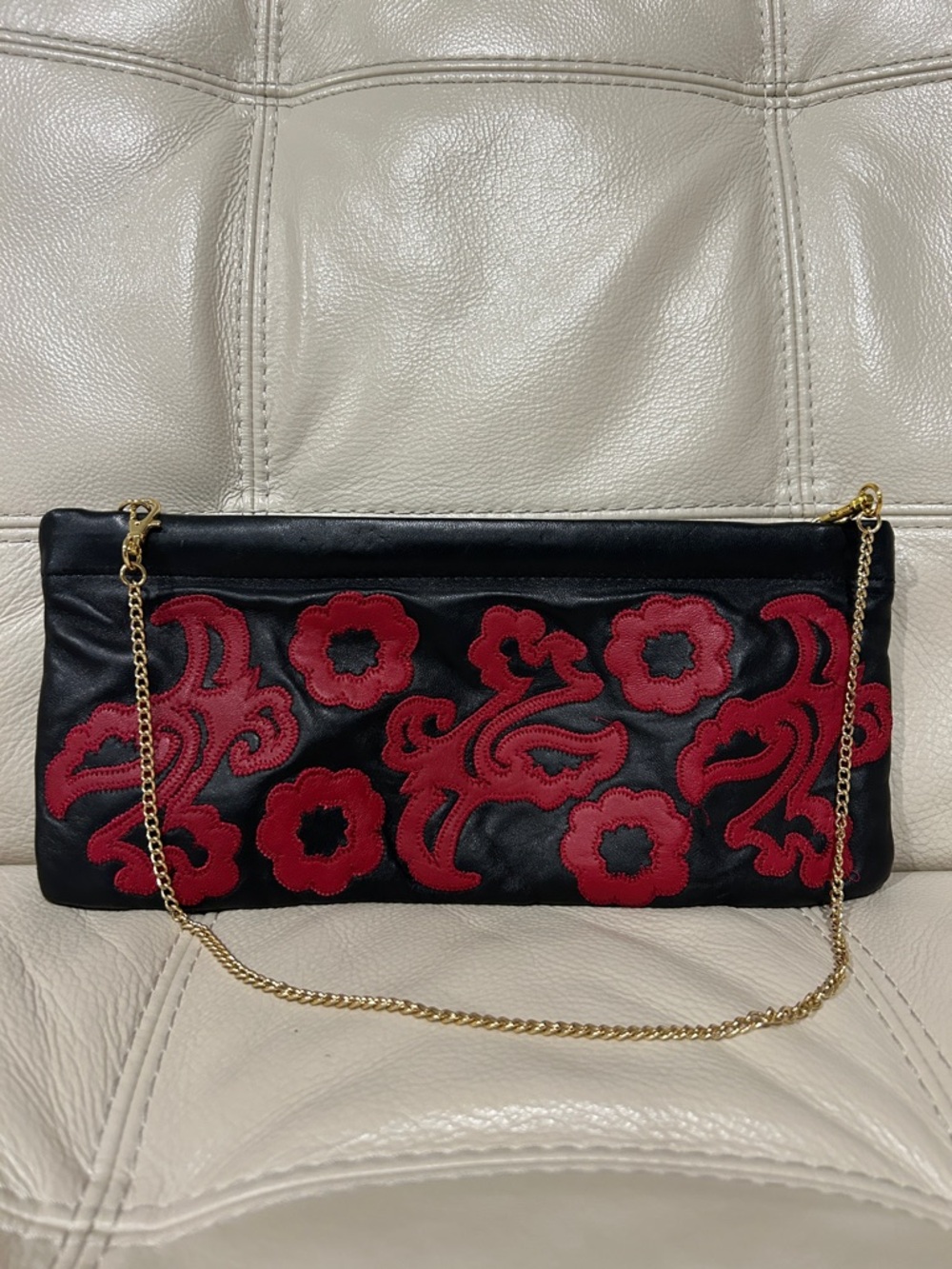 Black Leather Clutch with Red Floral Appliqué and Gold Chain Strap